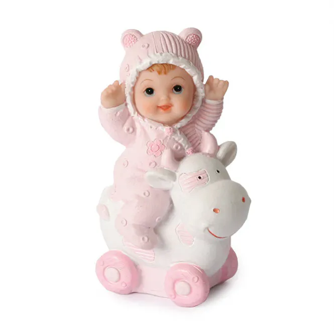 Hovedbilde Bordpynt - Baby på ku rosa